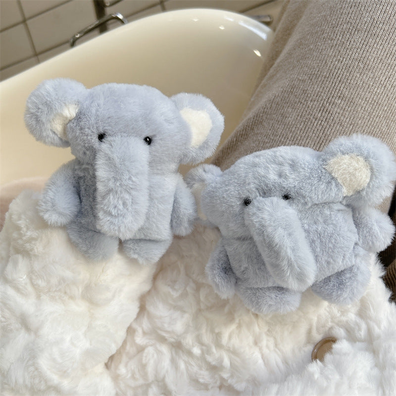 Close-up of the cute elephant AirPods® protective case, perfect for keeping earbuds safe at home or on the go.